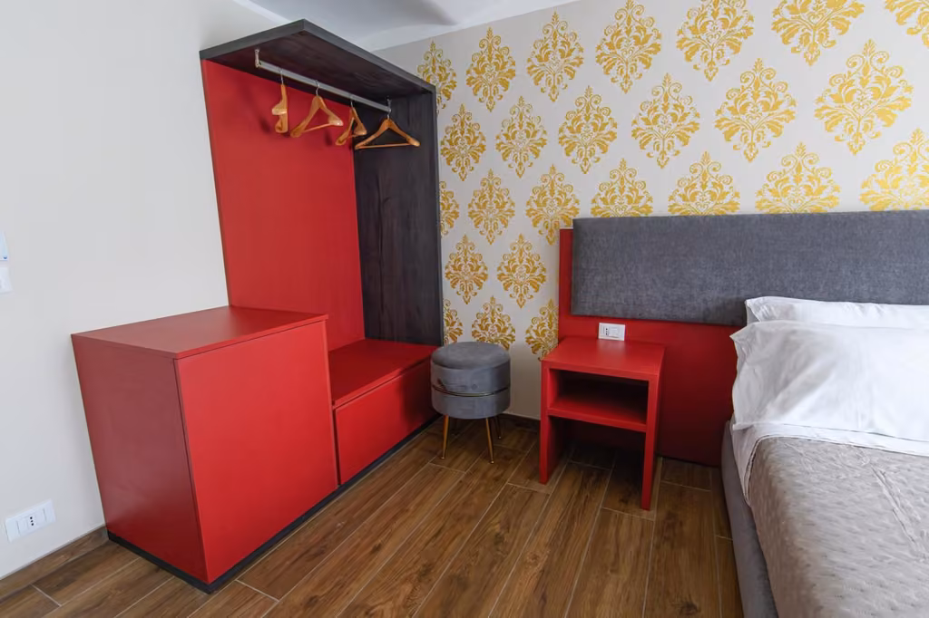 Letto di una delle camere del bed & breakfast in Piazza del Duomo